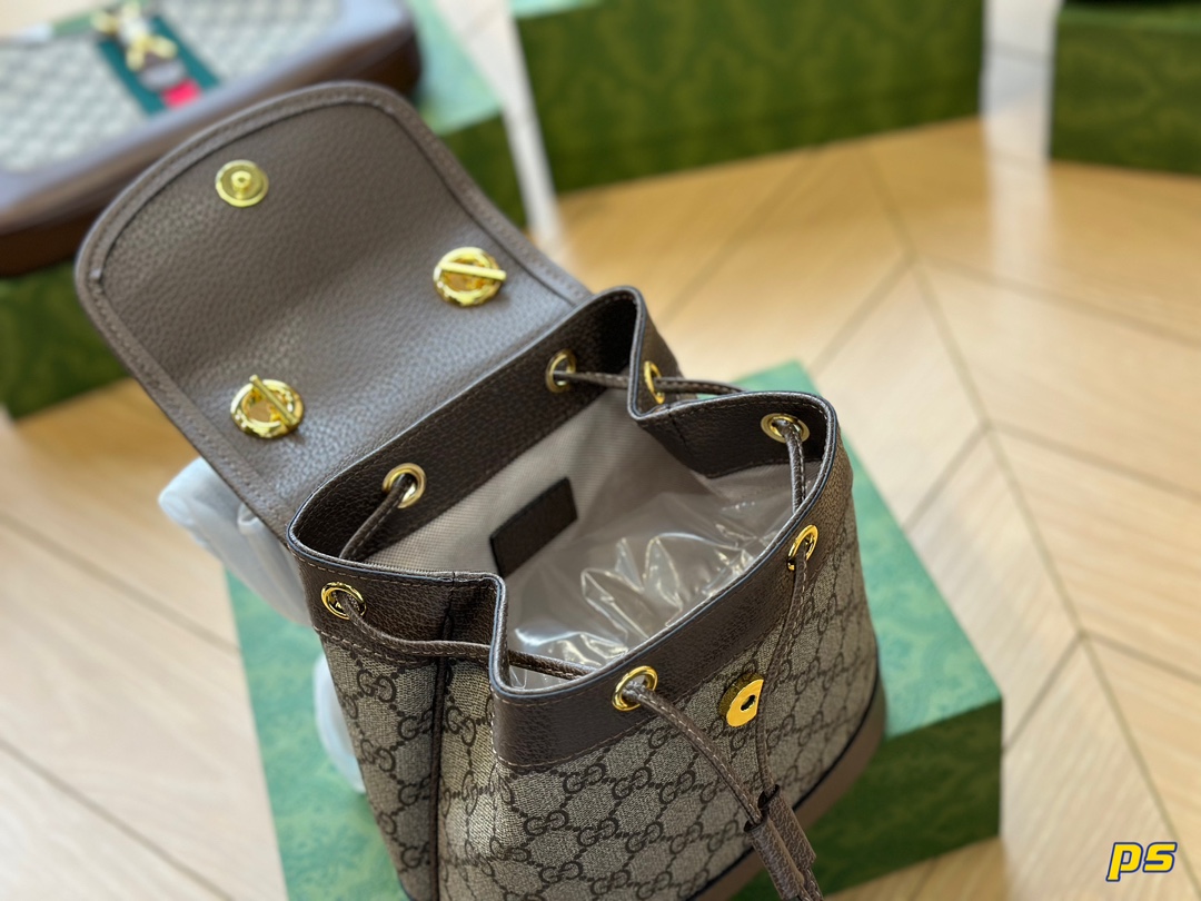 G-G mini backpack/backpack Beige and ebony GG with brown leather and adjustable shoulder strap.