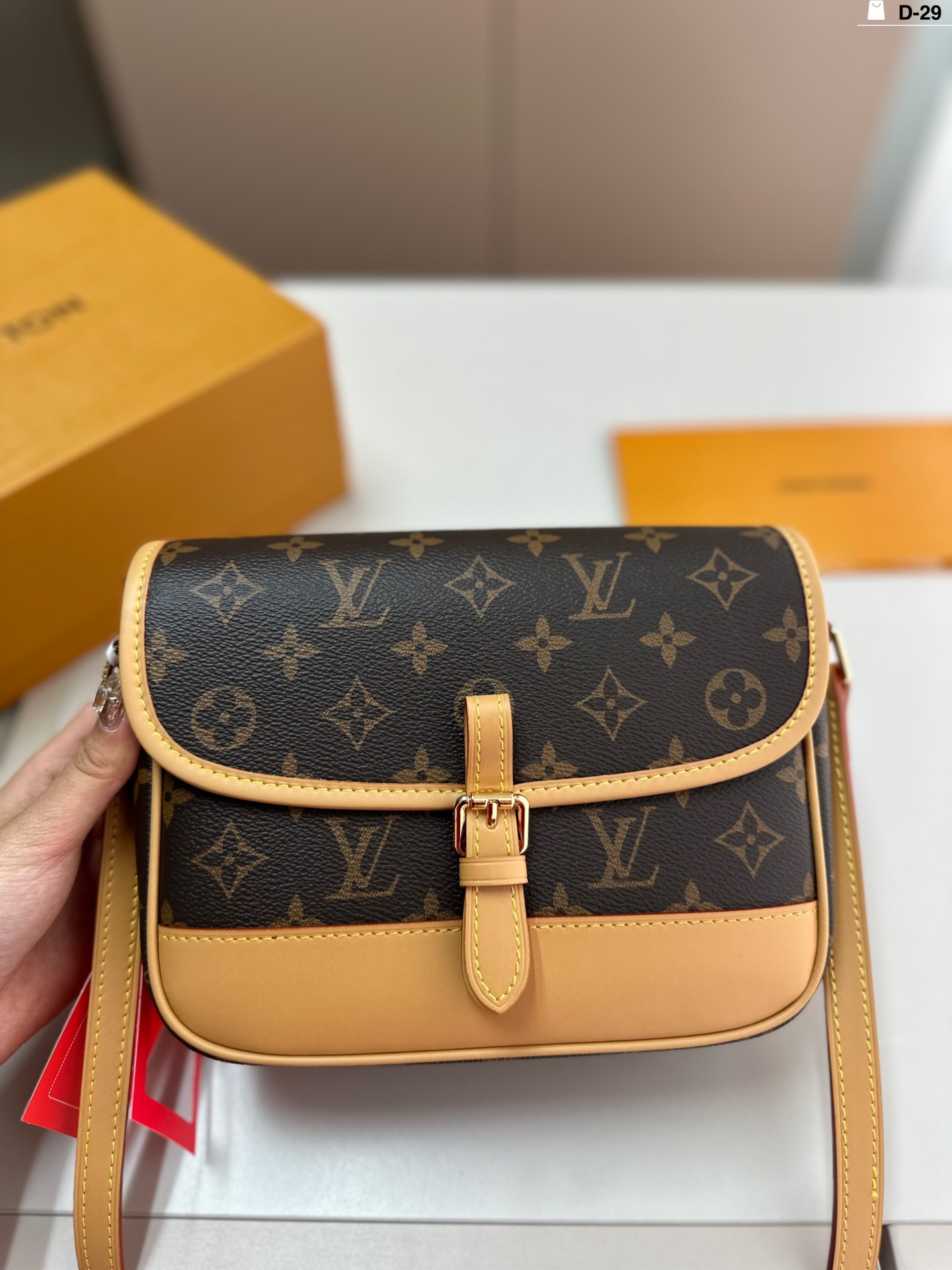 L-V The postman bag is simple and comfortable, super versatile.