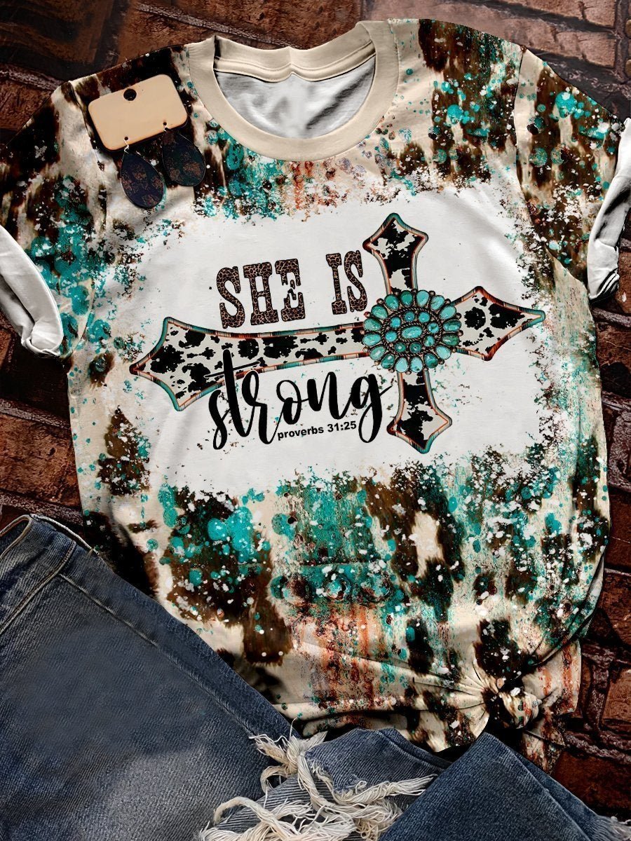 She is strong cross graphic tee