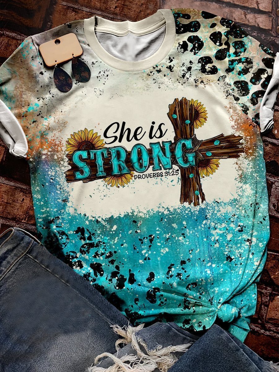 She is strong cross graphic tee