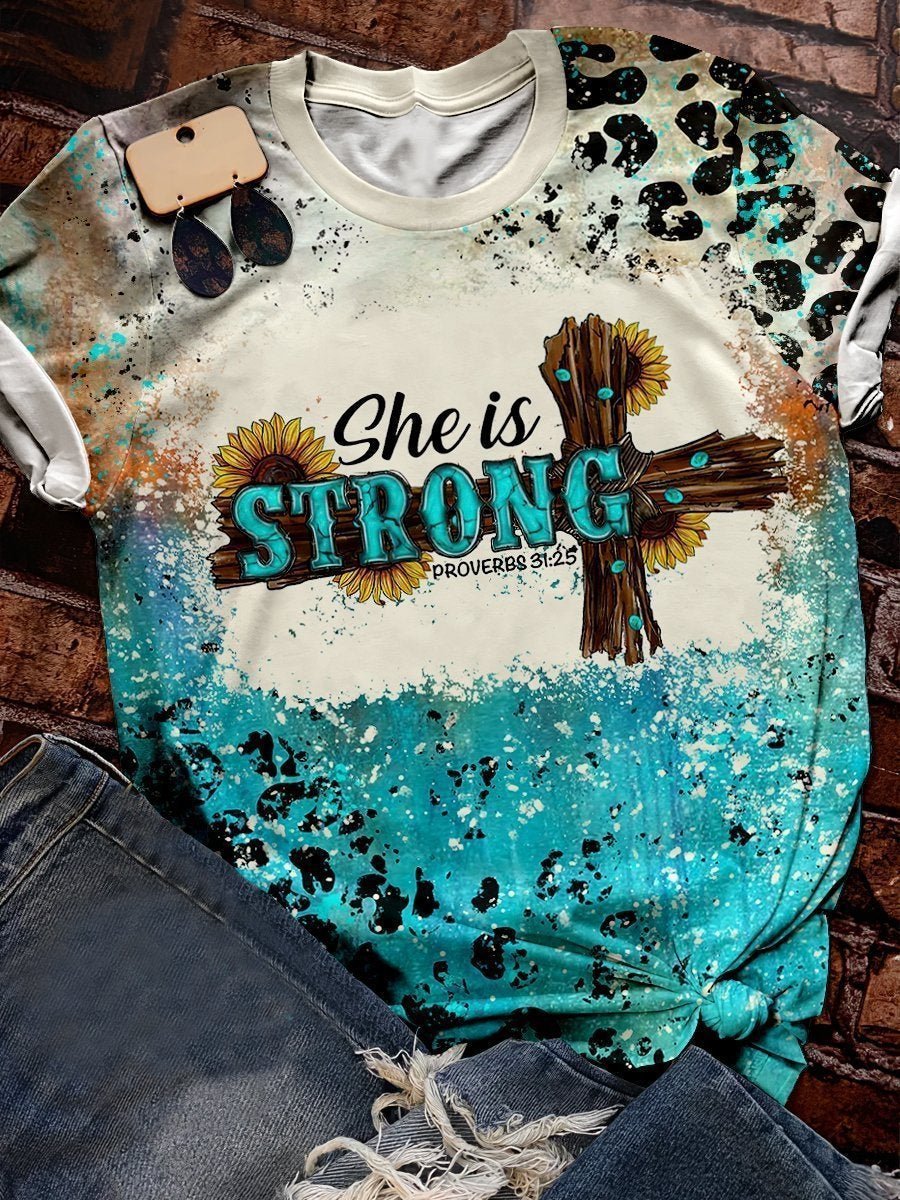 She is strong cross graphic tee