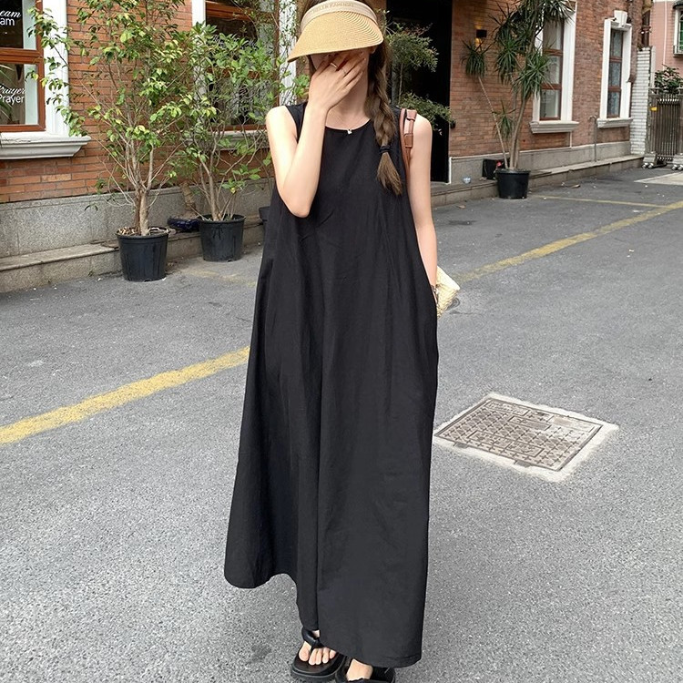 日韓慵懶感顯白露背度假風吊帶連身裙-HaloBless