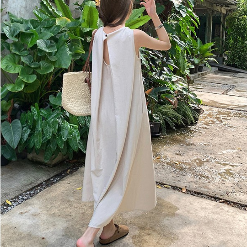 日韓慵懶感顯白露背度假風吊帶連身裙-HaloBless