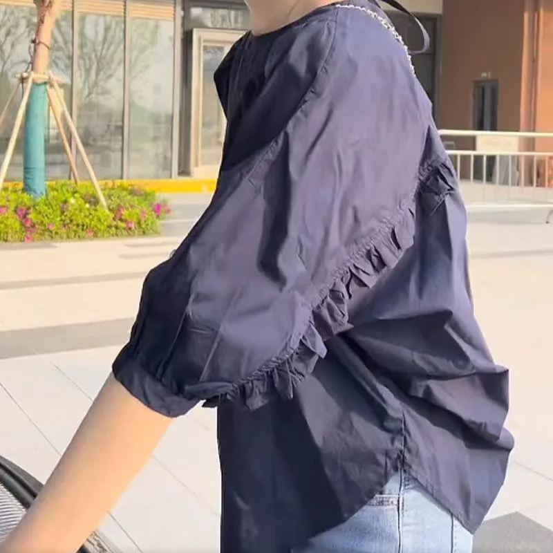 寬鬆顯瘦大碼木耳邊不規則設計感襯衫-HaloBless