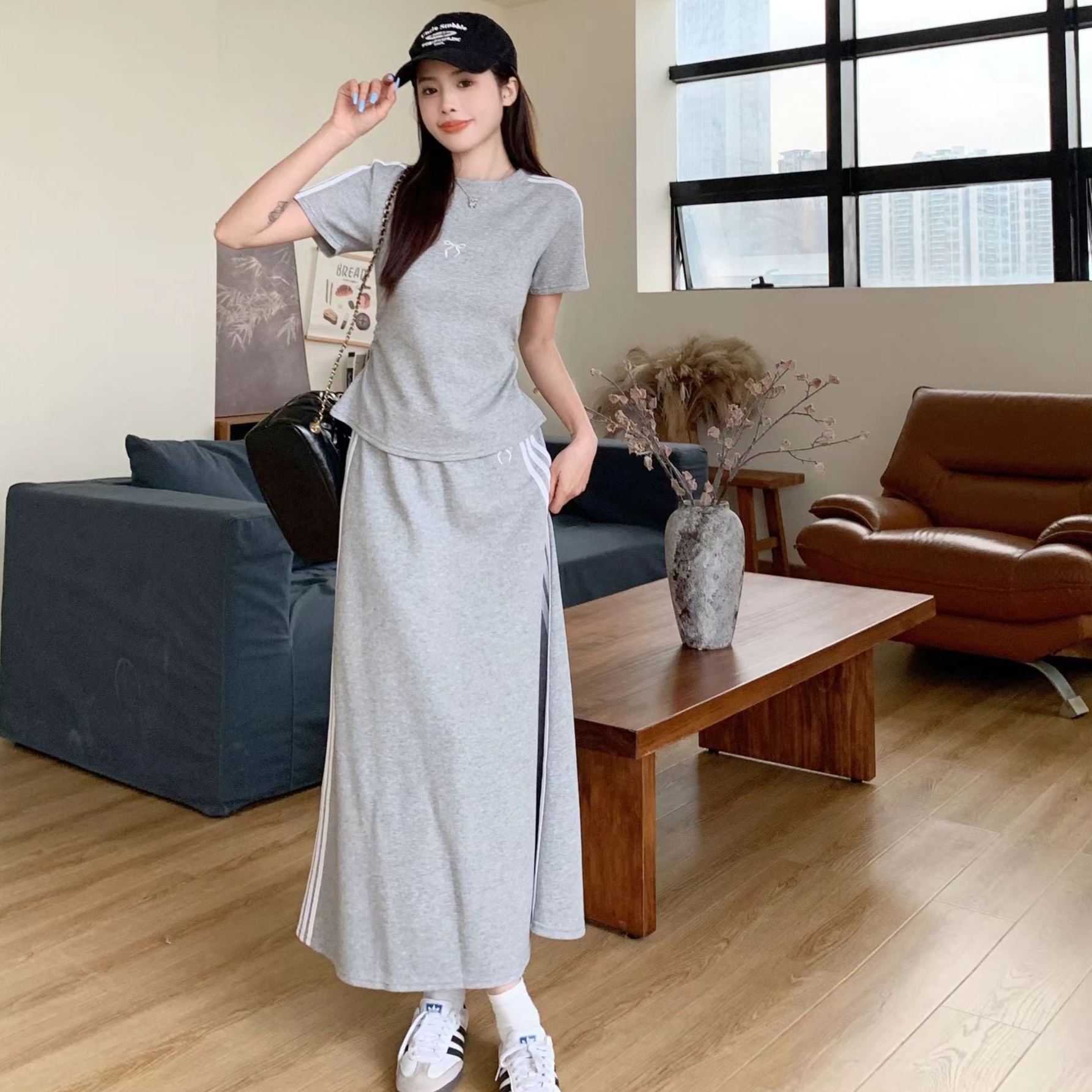 【套裝】慵懶風休閒時尚短袖t恤高腰A字裙運動風兩件套裝-HaloBless