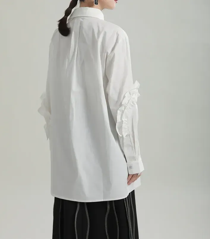 Long Shirt with Asymmetrical Neckline and Flounces.