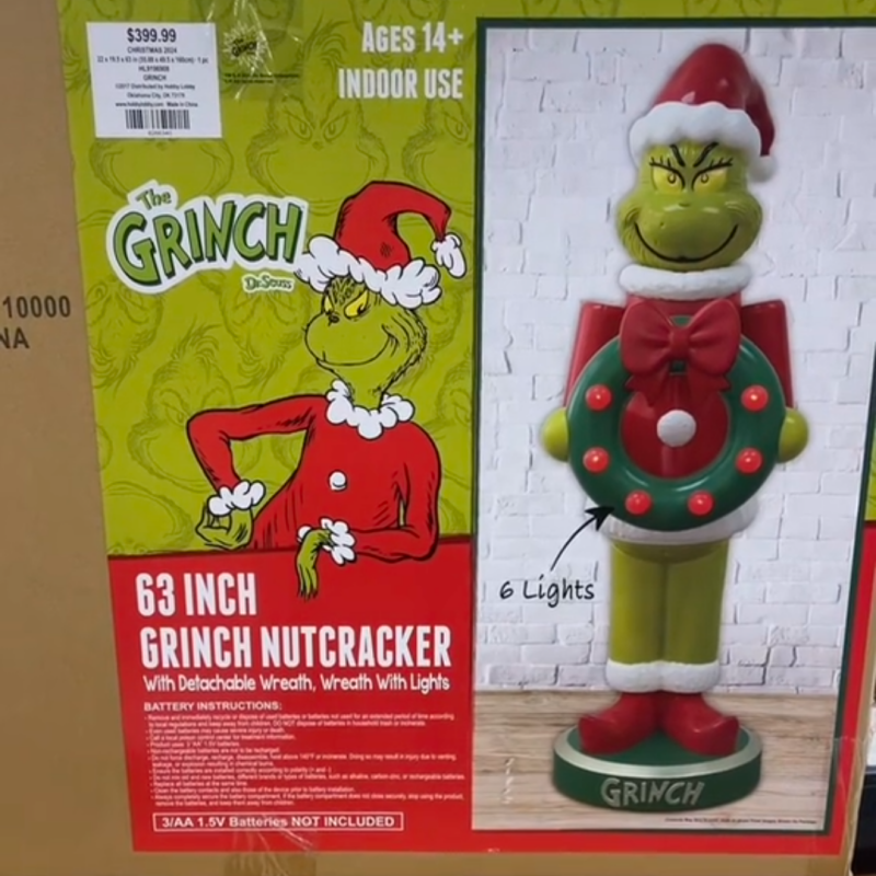 63-Inch Grinch LED Nutcracker Holding Wreath