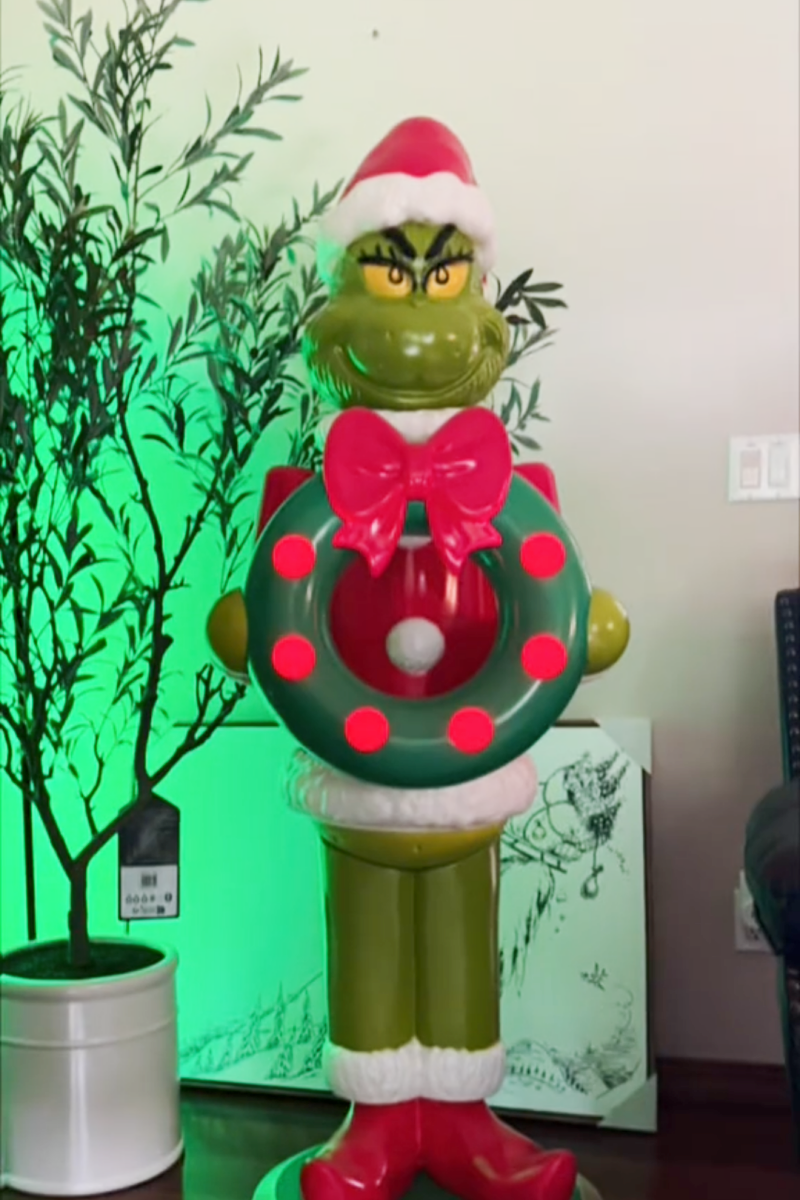 63-Inch Grinch LED Nutcracker Holding Wreath