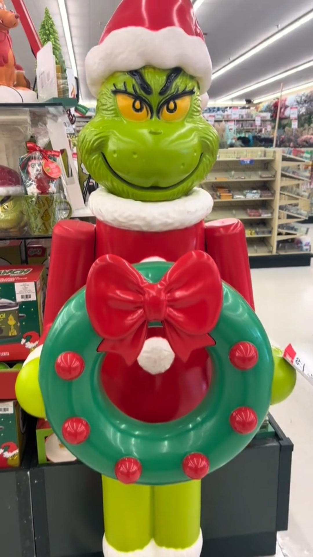 63-Inch Grinch LED Nutcracker Holding Wreath