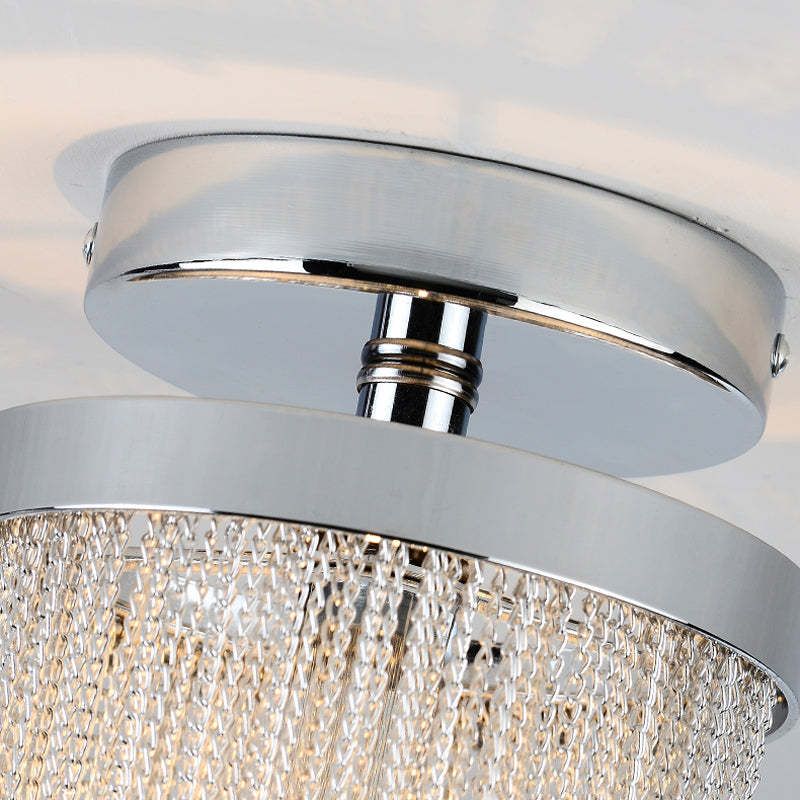 Close-up of the Tassel ceiling light canopy and hanging chains