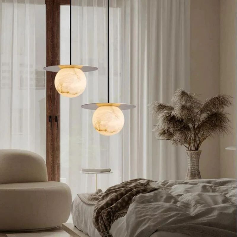 Alabaster Sphere Pendant Light Above Bed detail view
