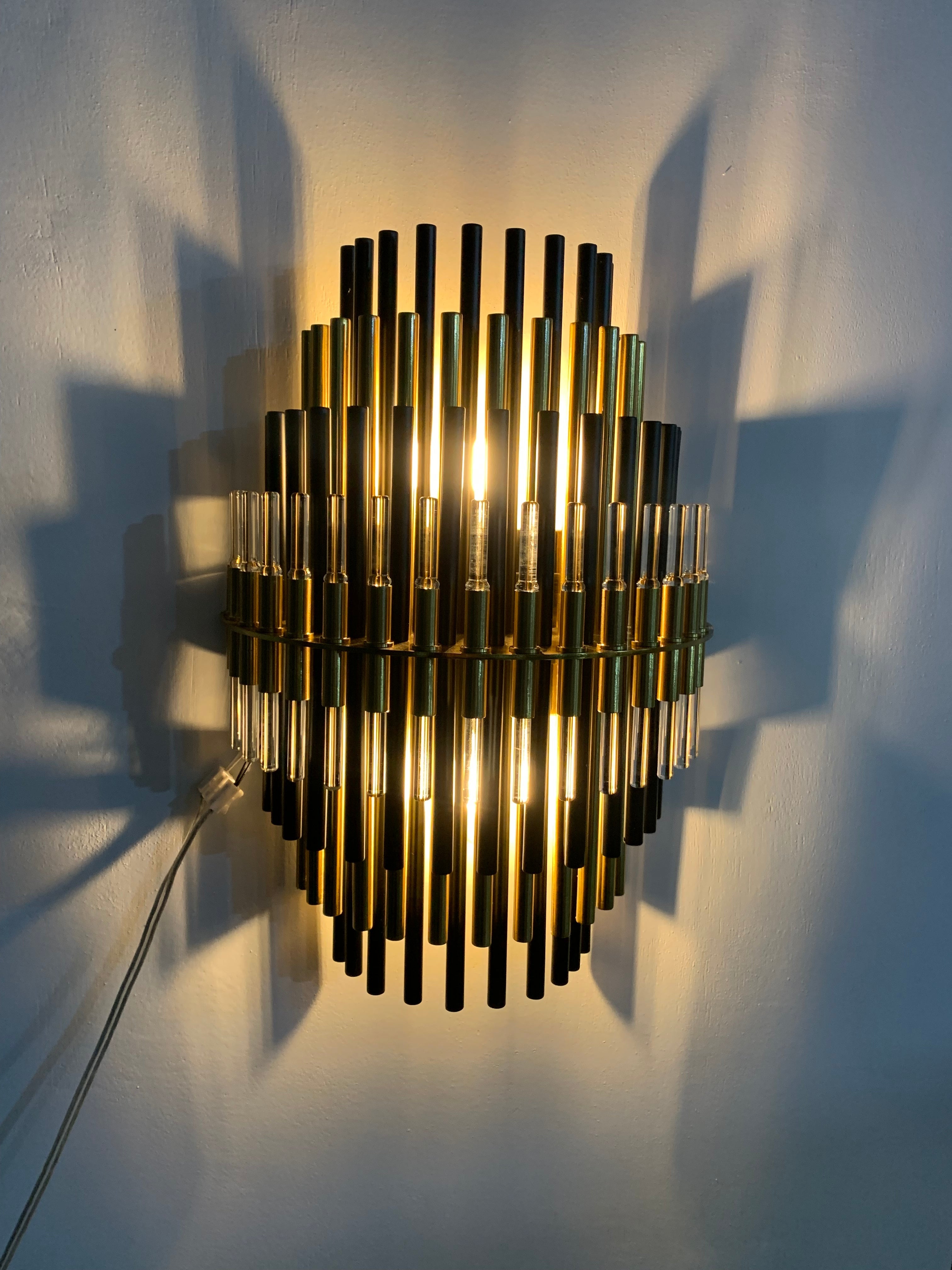 Sturdy Industrial Metal Tubes Wall Sconce in brass and iron