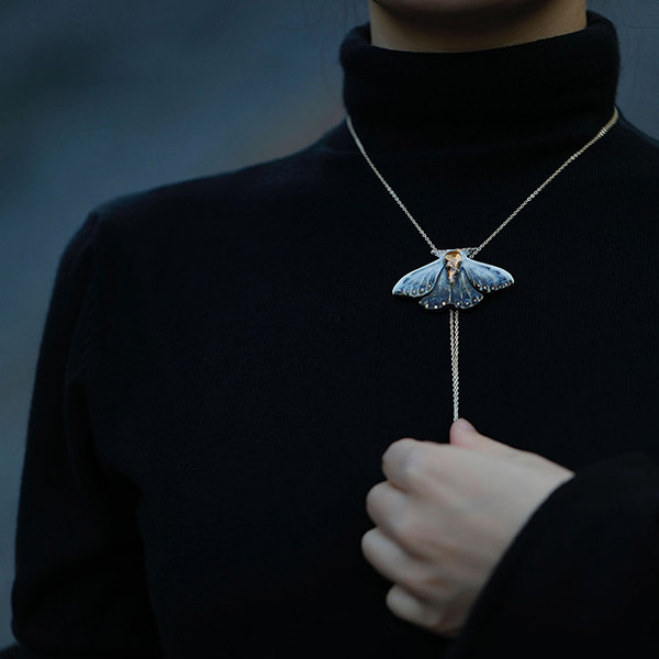 Handcrafted ceramic Blue Moth Necklace