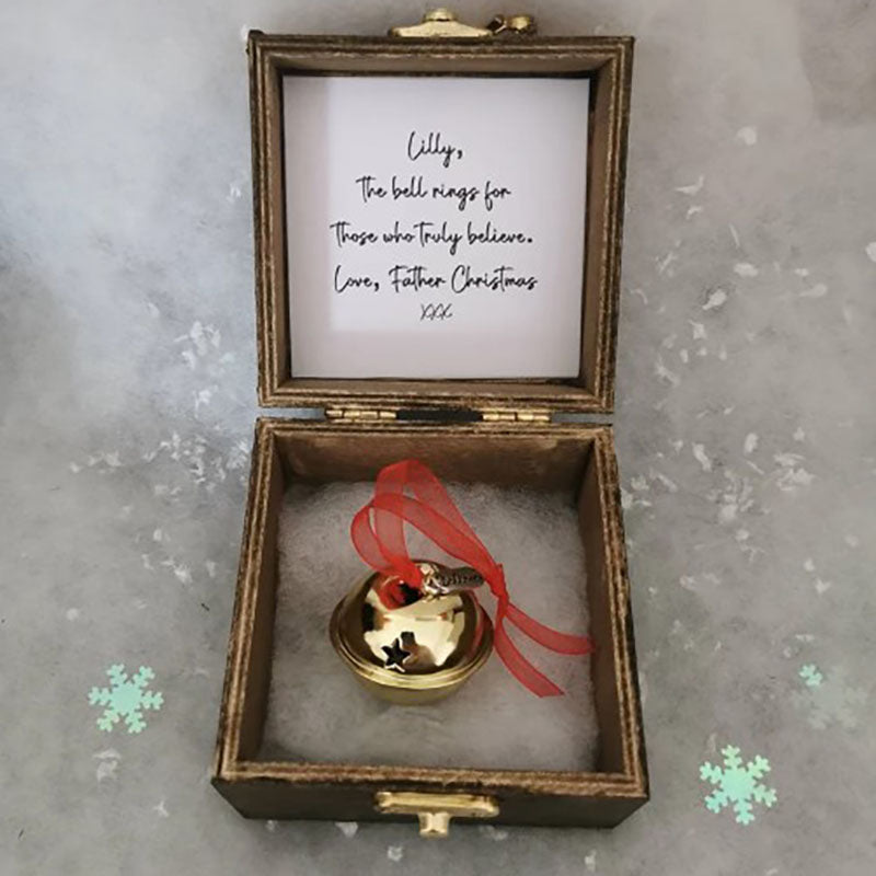 A Beautiful Magical Believe Bell in a Rustic Christmas Eve Box