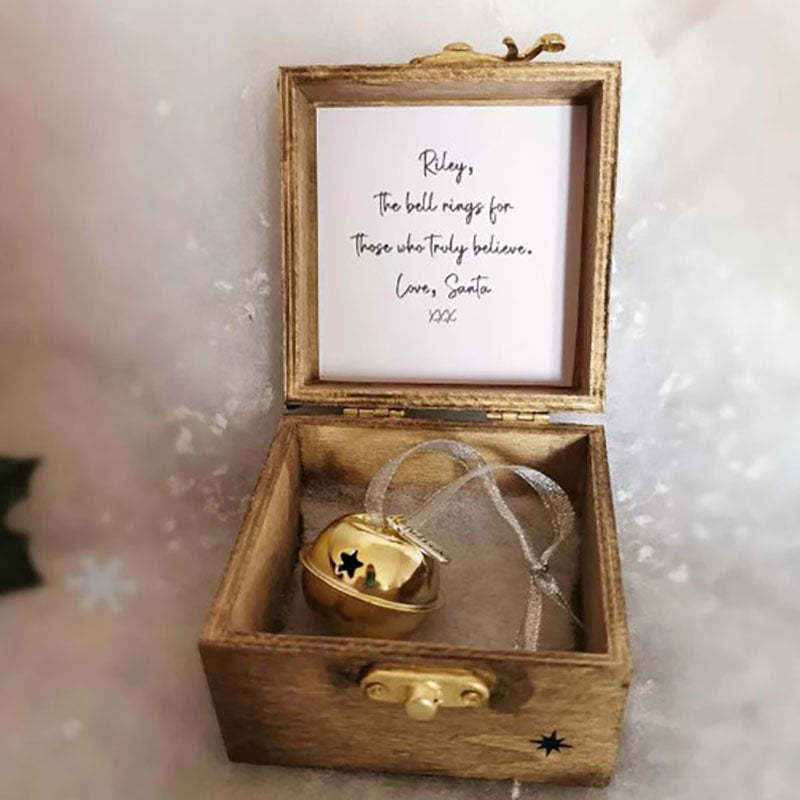 A Beautiful Magical Believe Bell in a Rustic Christmas Eve Box