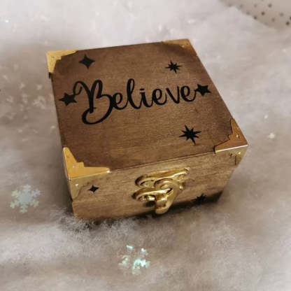A Beautiful Magical Believe Bell in a Rustic Christmas Eve Box
