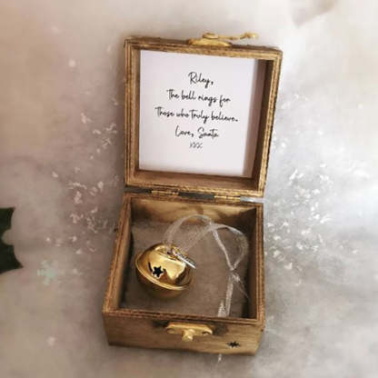 A Beautiful Magical Believe Bell in a Rustic Christmas Eve Box