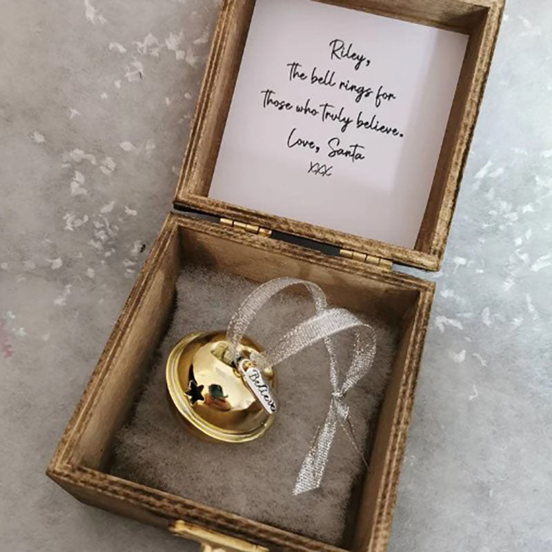 A Beautiful Magical Believe Bell in a Rustic Christmas Eve Box