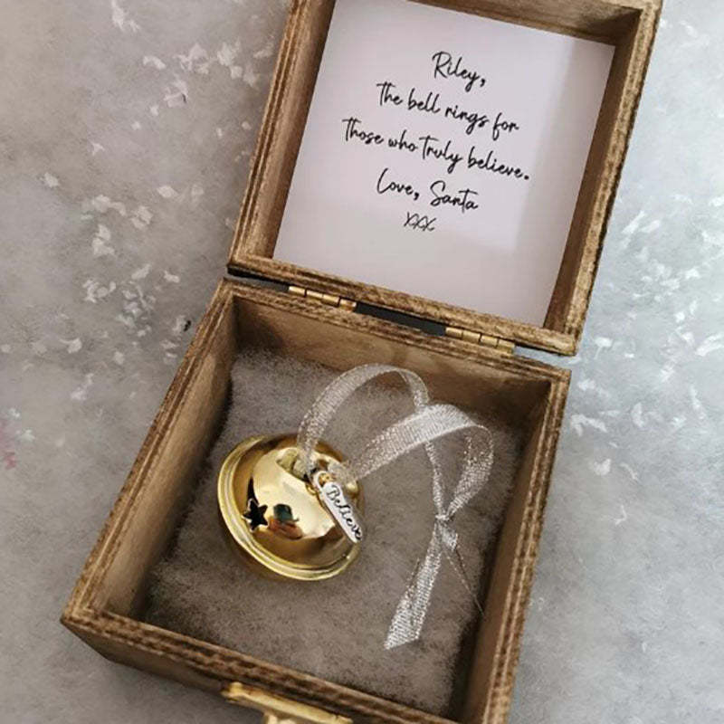 A Beautiful Magical Believe Bell in a Rustic Christmas Eve Box