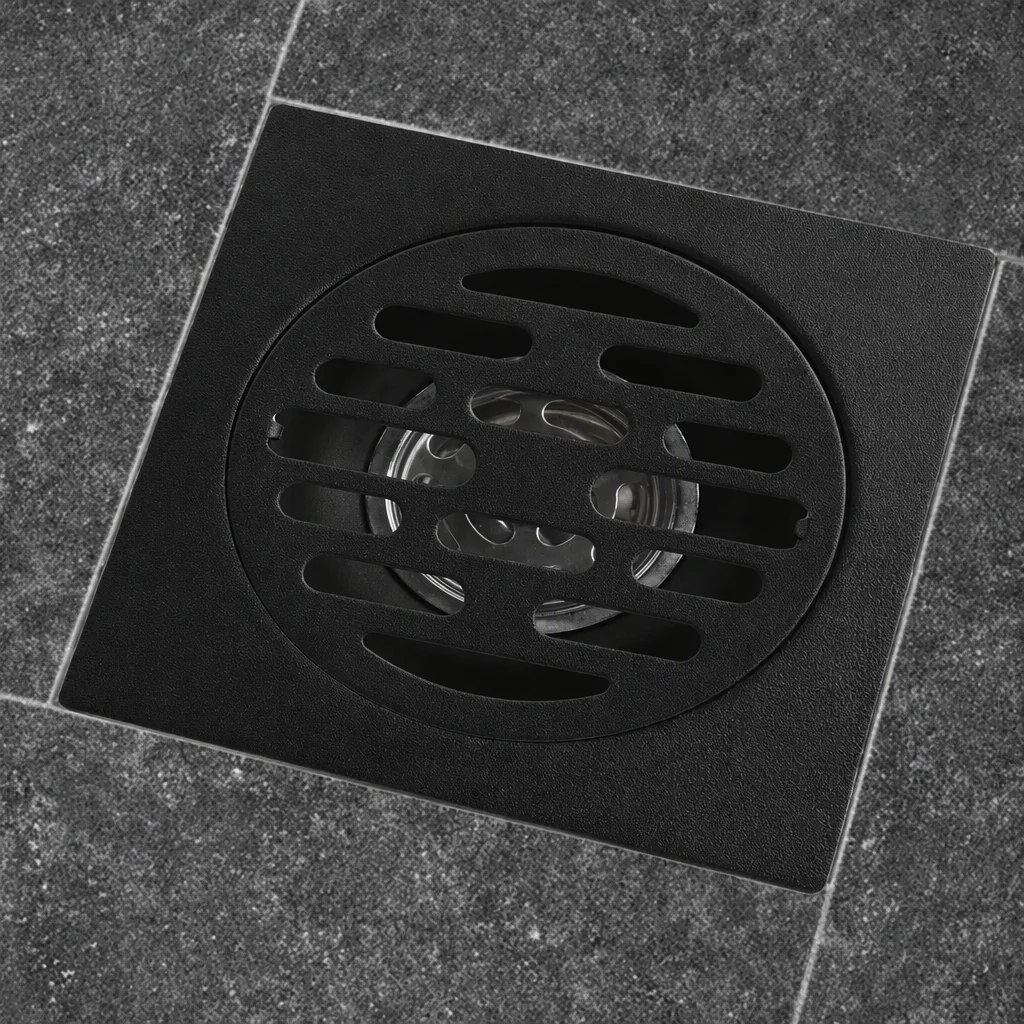 Matte black square floor drain with round slotted grate
