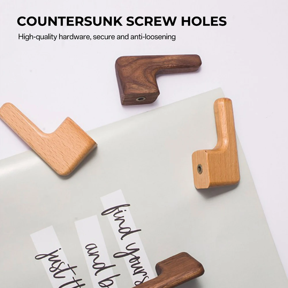 Solid wood wall hook mounted on a wall
