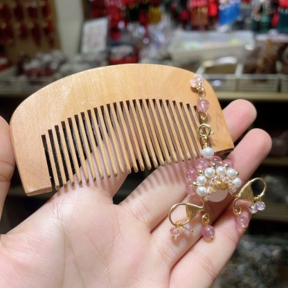 檀木搭配中国风脸谱梳子，尺寸约100538mm，价格15元