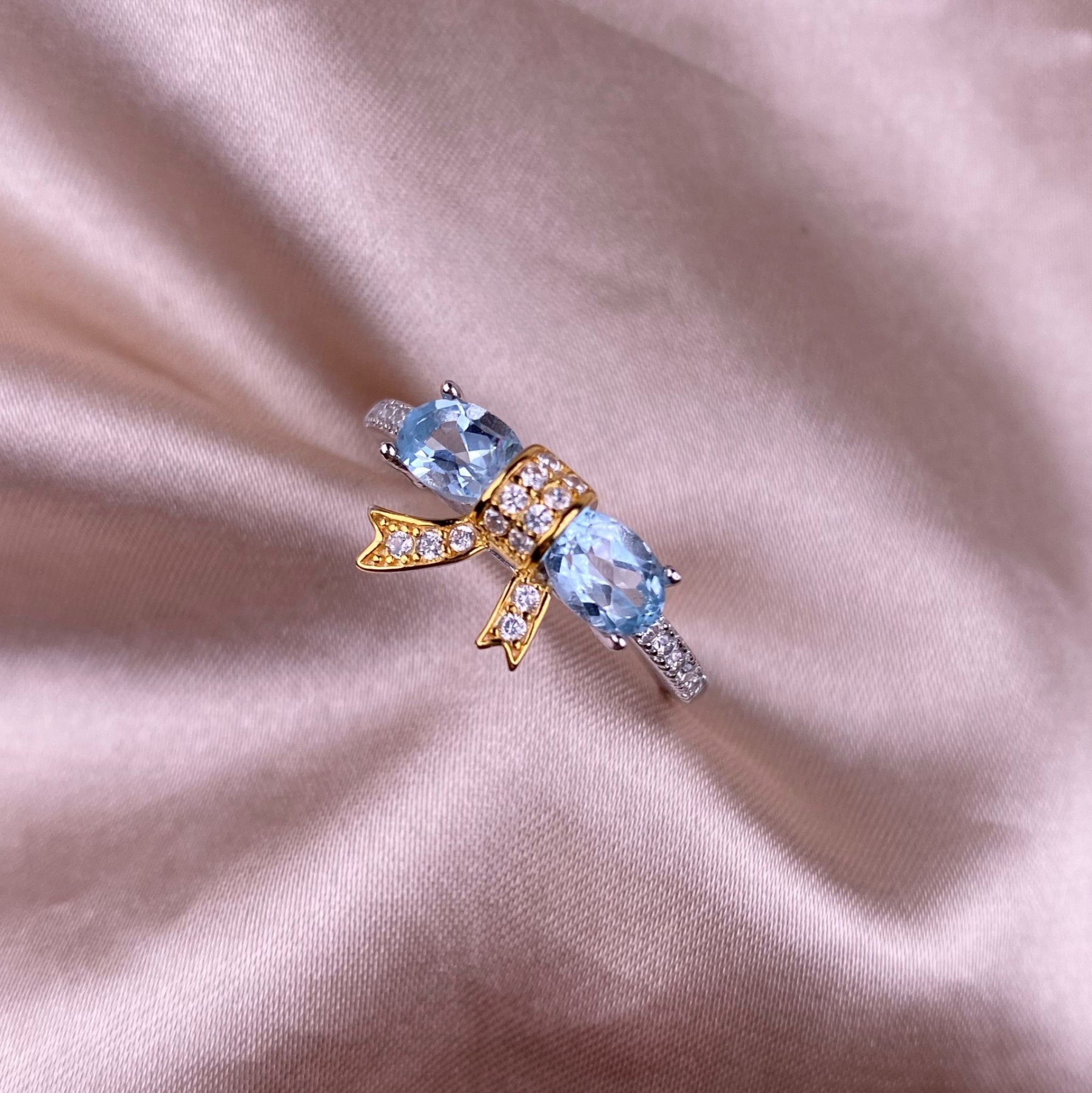 Swiss Blue Topaz S925 Gold Bowknot Design Silver Ring