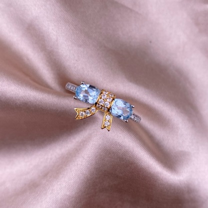 Swiss Blue Topaz S925 Gold Bowknot Design Silver Ring
