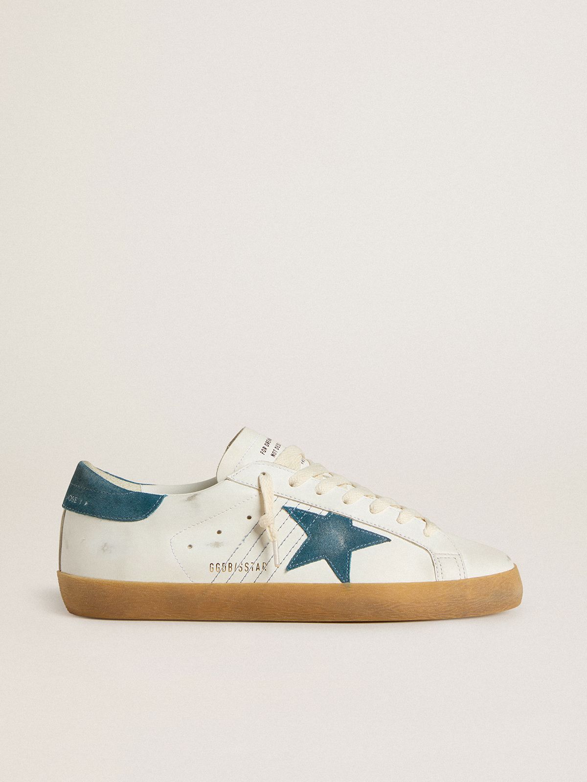 Sup-S in leather with petrol-blue suede star and heel tab