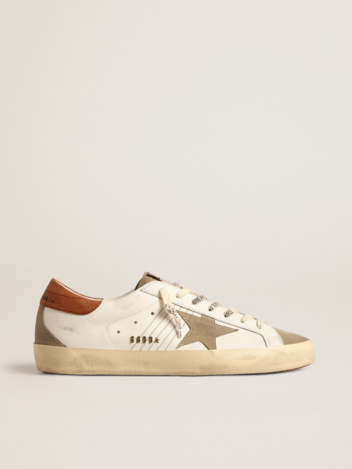 Sup-S with suede star and brown leather heel tab