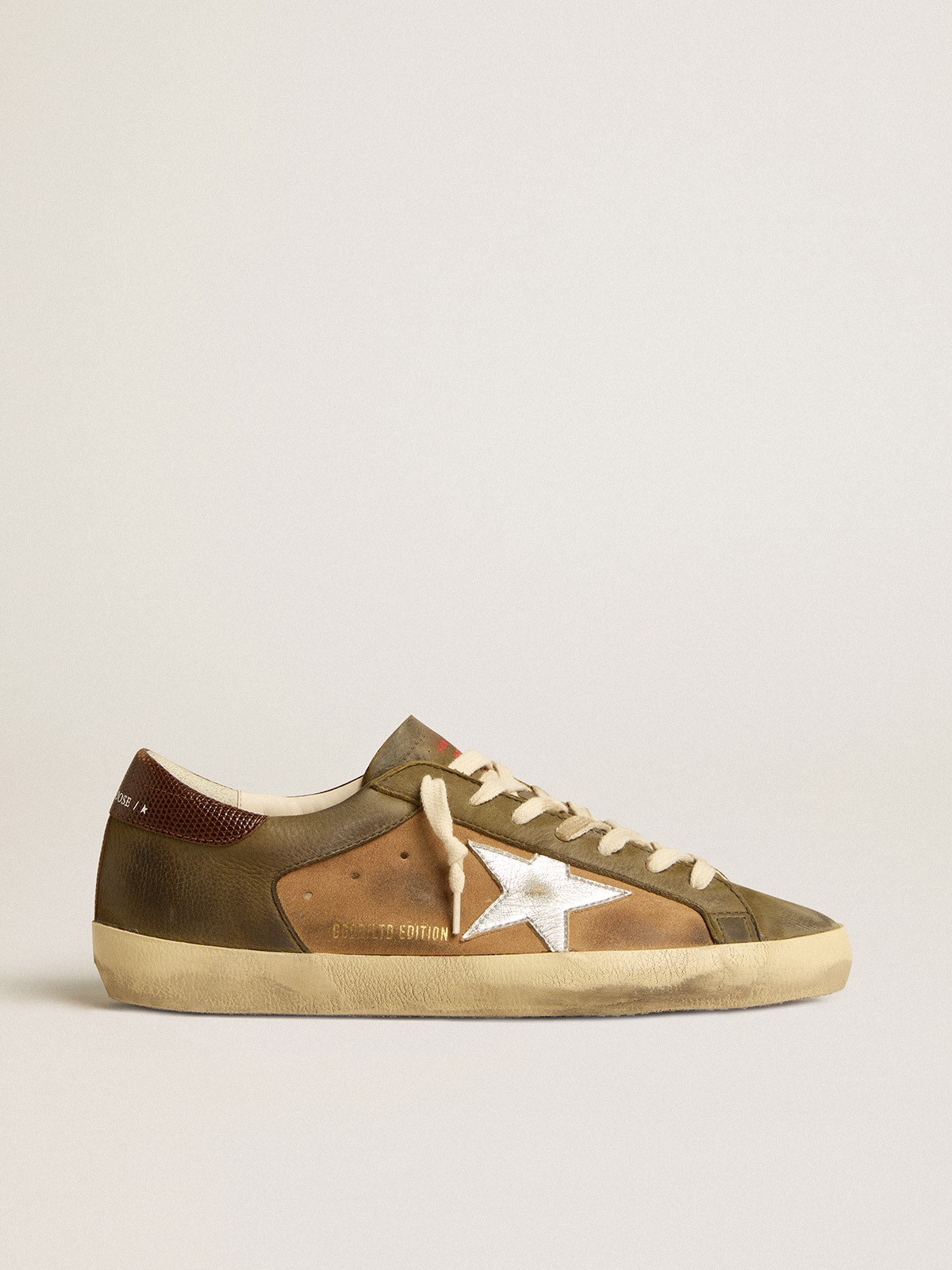 Sup-S LTD in green leather and tobacco-colored suede with silver star