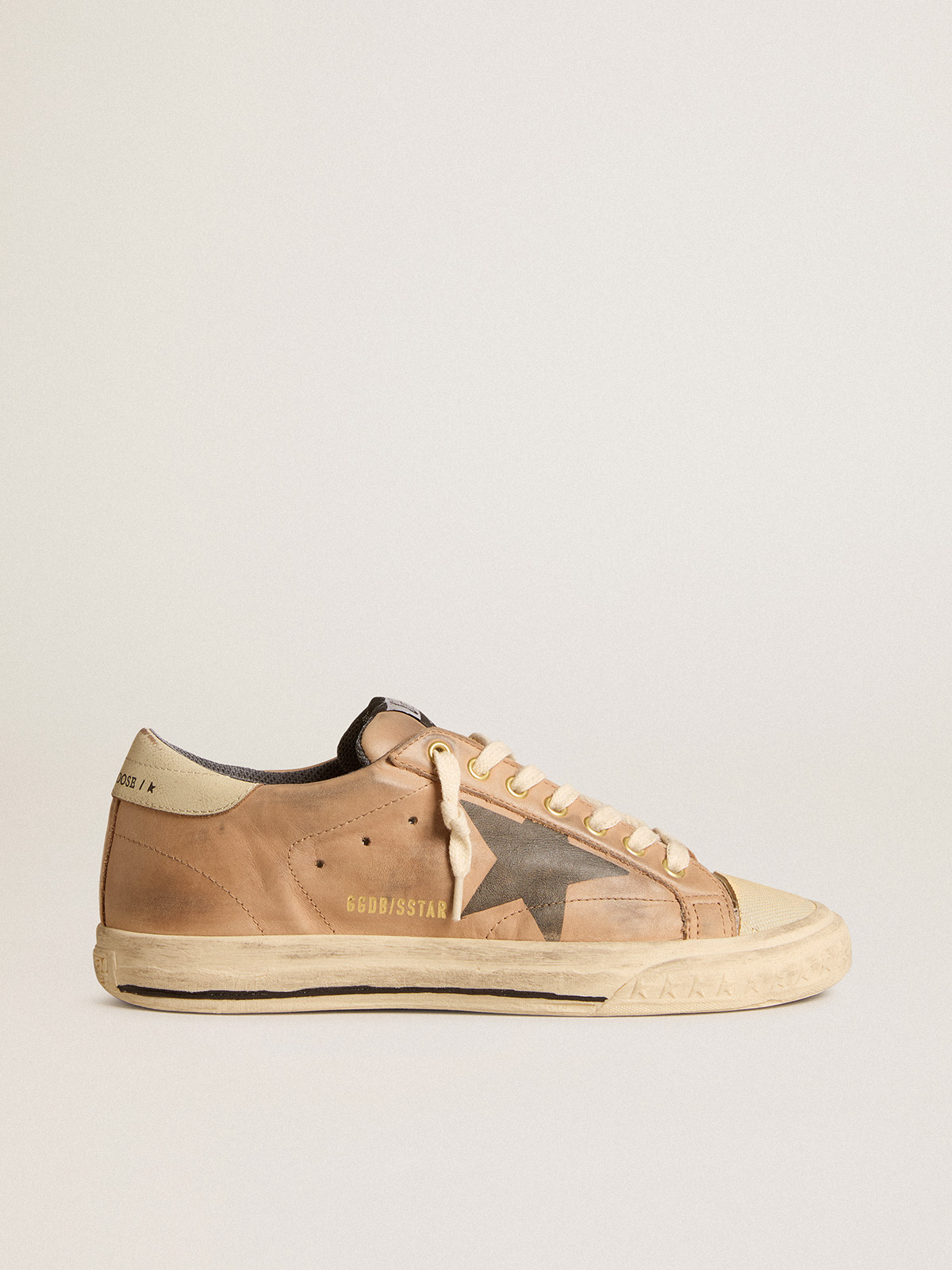 Sup-S in beige nubuck with black printed star and leather heel tab