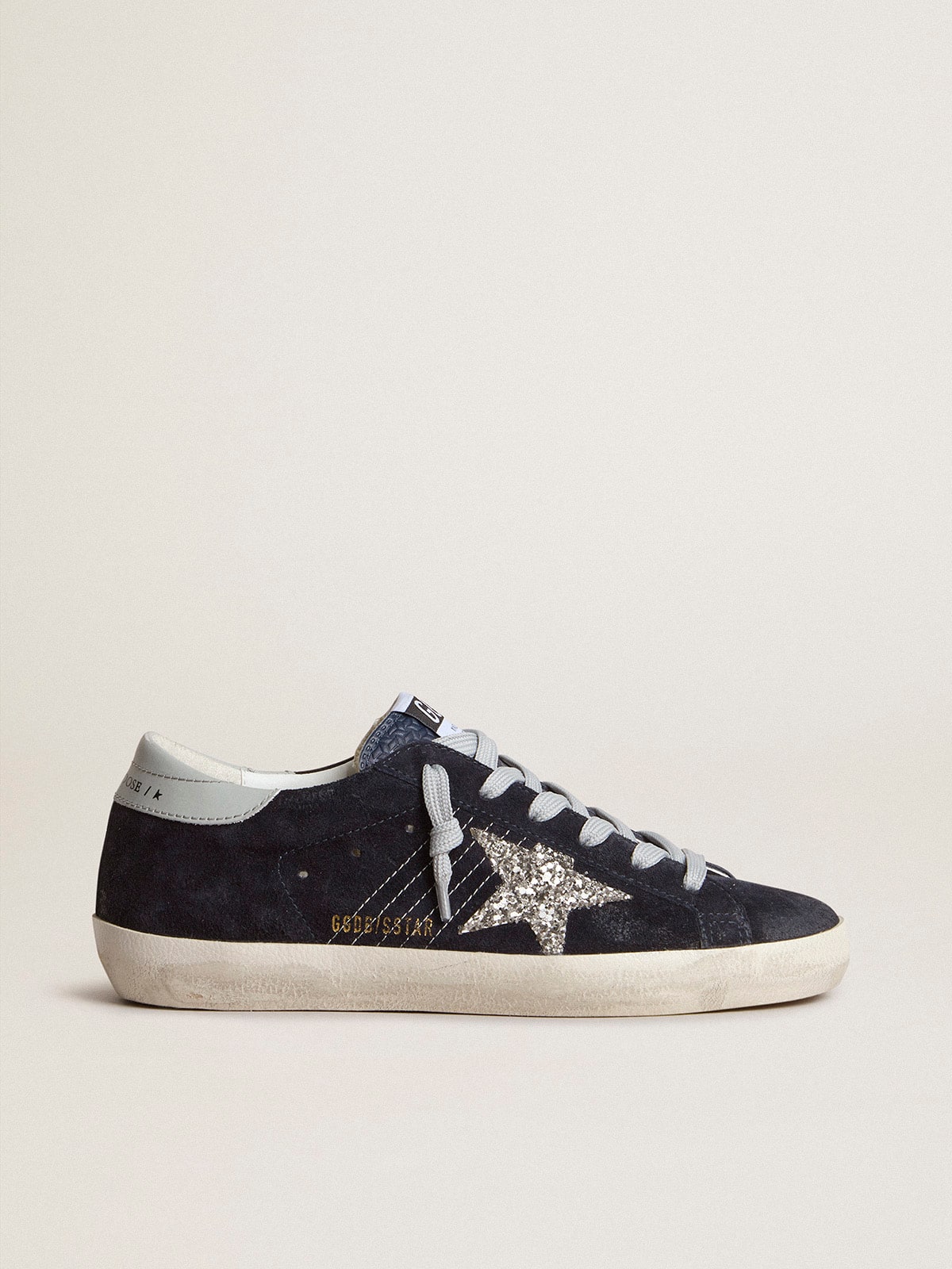 Sup-S in blue suede, silver glitter star and leather heel tab