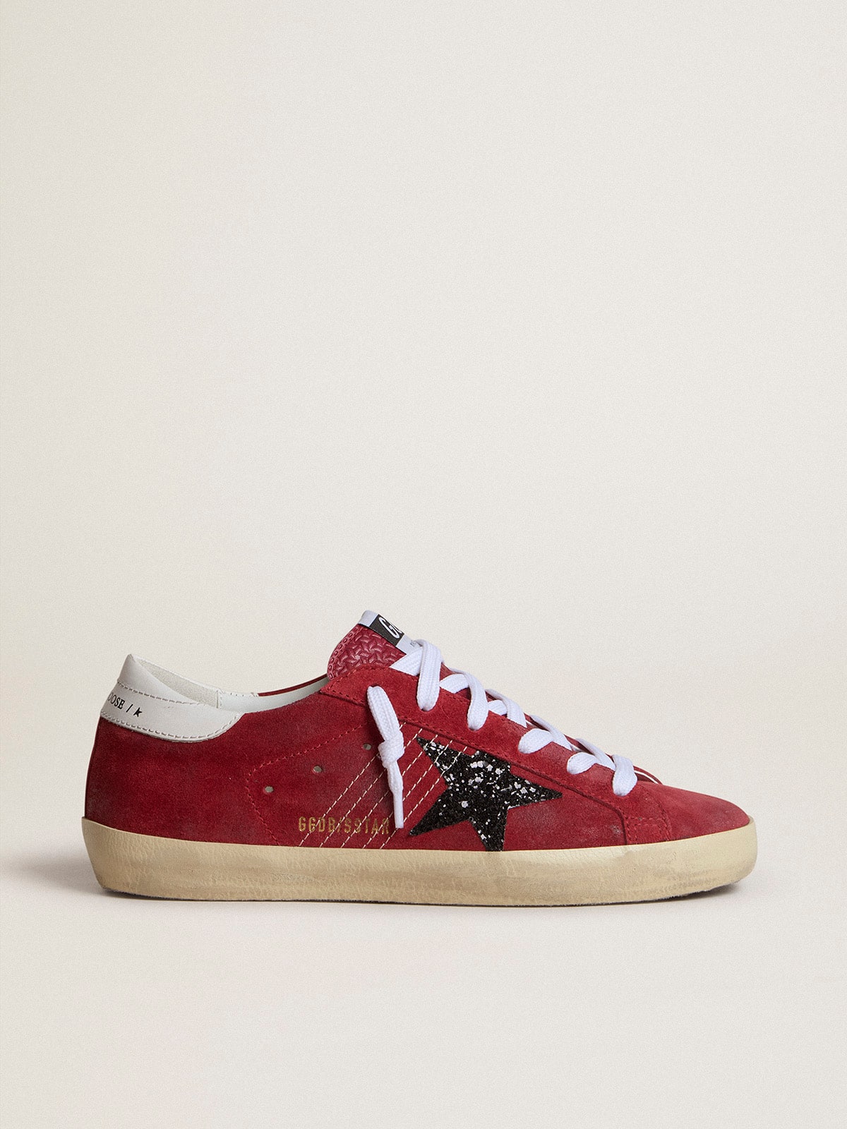 Women’s Sup-S in red suede with glitter star and white heel tab