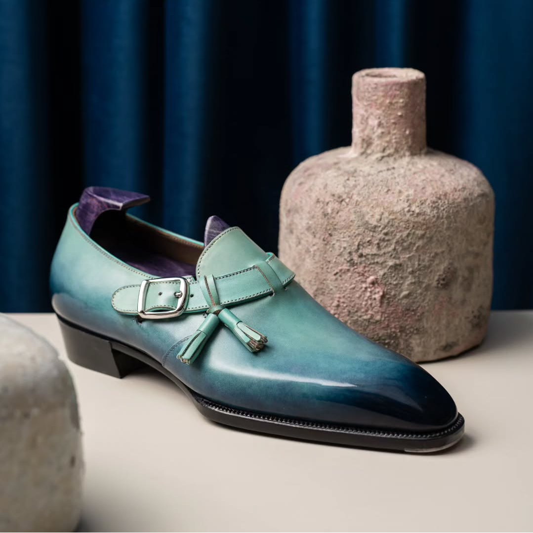 Inspired By The Sky Blue Glazed Jun Porcelain Fragments, ACME Has Created This Elegant And Warm Single Monk Piece. Hand-painted With Natural Dye, It Flows Over The Delicate, Selected Cowhide