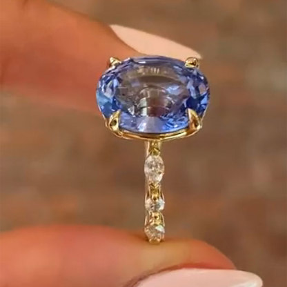 2CT Blue Oval Cut High Carbon Stone & Colorless Moissanite Engagement Ring In Sterling Silver