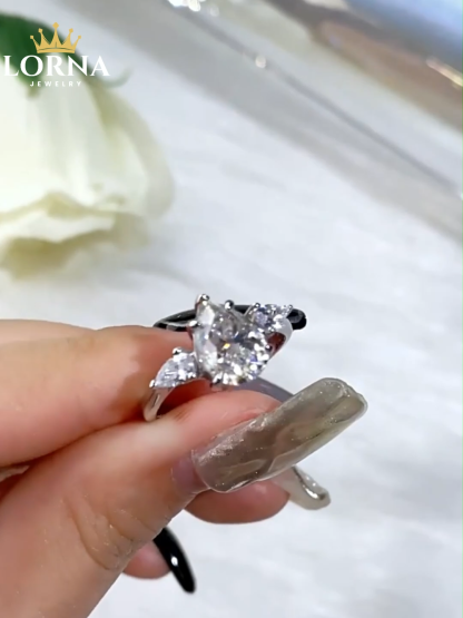 2Ct Moissanite Pear Cut Three Stone Ring