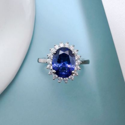 2Ct Luxurious Halo Oval Cut Blue Sapphire Engagement Ring In Sterling Silver