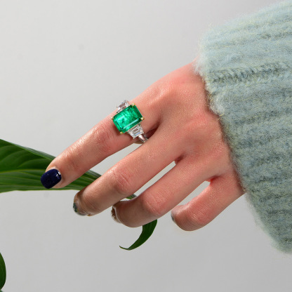 8Ct Emerald Cut Green Three-Stone Ring