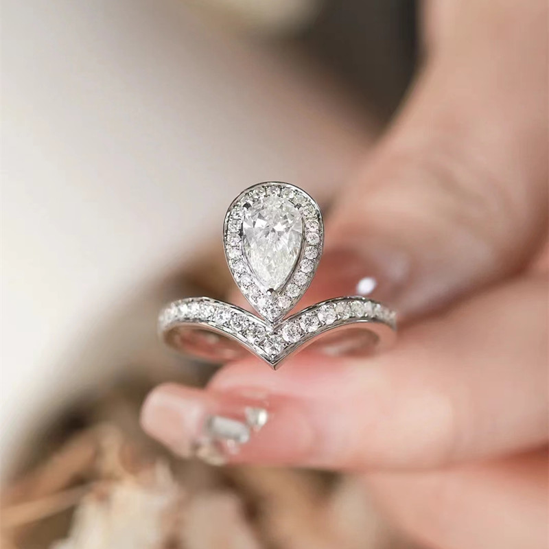 1Ct Moissanite Pear Cut with V-Shaped Band Halo Engagement Ring in Sterling Silver