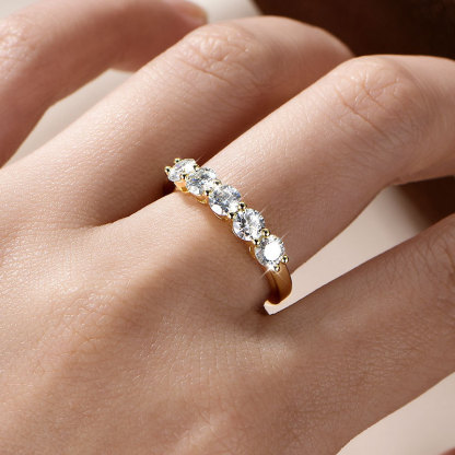 Moissanite Five-Stone Round Cut Shared Prong Wedding Band in Sterling Silver