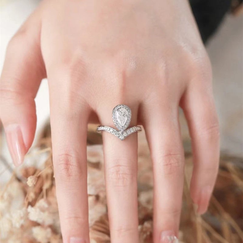 1Ct Moissanite Pear Cut with V-Shaped Band Halo Engagement Ring in Sterling Silver