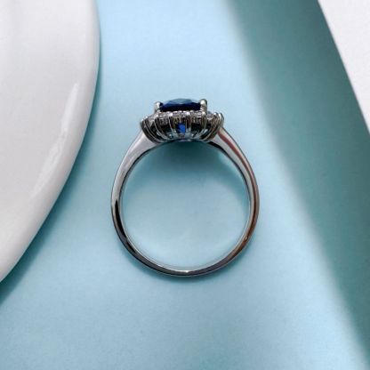 2Ct Luxurious Halo Oval Cut Blue Sapphire Engagement Ring In Sterling Silver