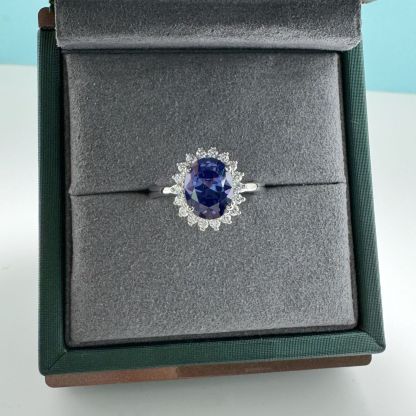 2Ct Luxurious Halo Oval Cut Blue Sapphire Engagement Ring In Sterling Silver