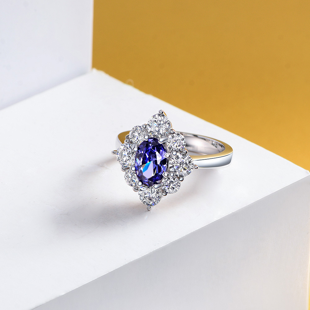 1.5Ct Oval Cut Blue Gemstone Halo Design Ring