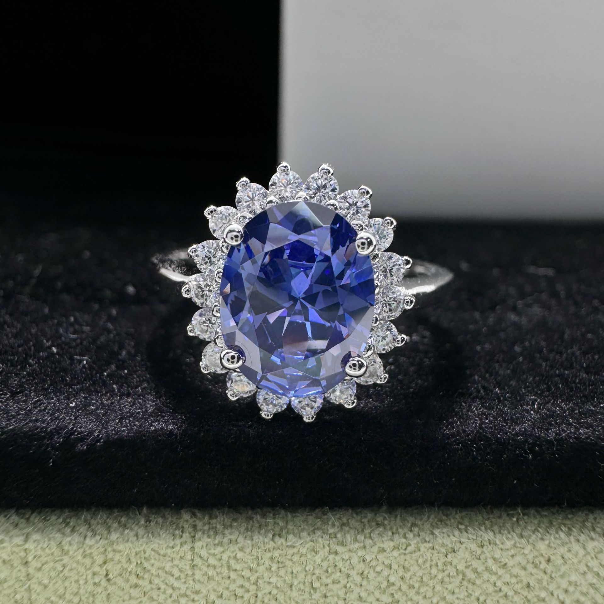 2Ct Luxurious Halo Oval Cut Blue Sapphire Engagement Ring In Sterling Silver