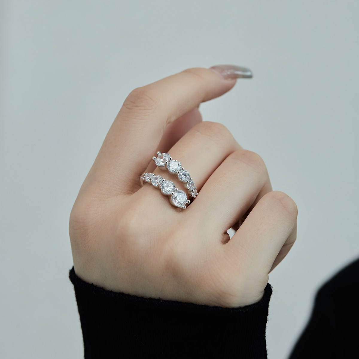 Moissanite Graduated Round Cut Two-Row Wrap Band in Sterling Silver