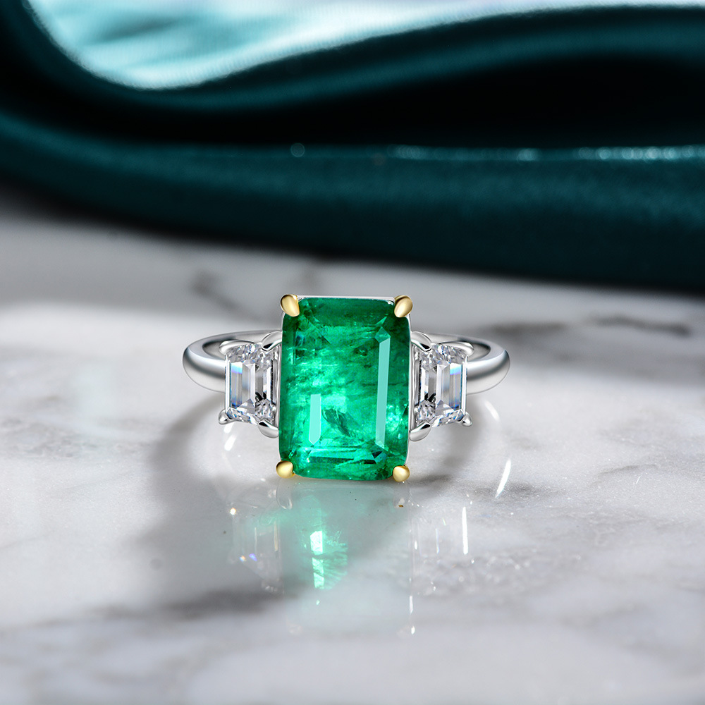8Ct Emerald Cut Green Three-Stone Ring
