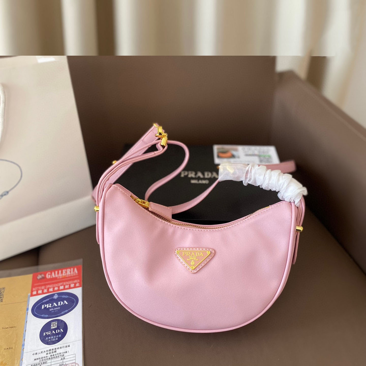 Arqué small leather shoulder bag