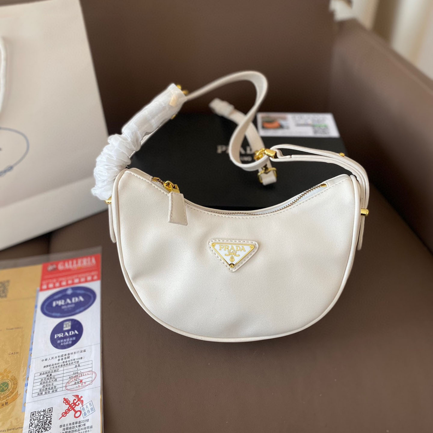 Arqué small leather shoulder bag